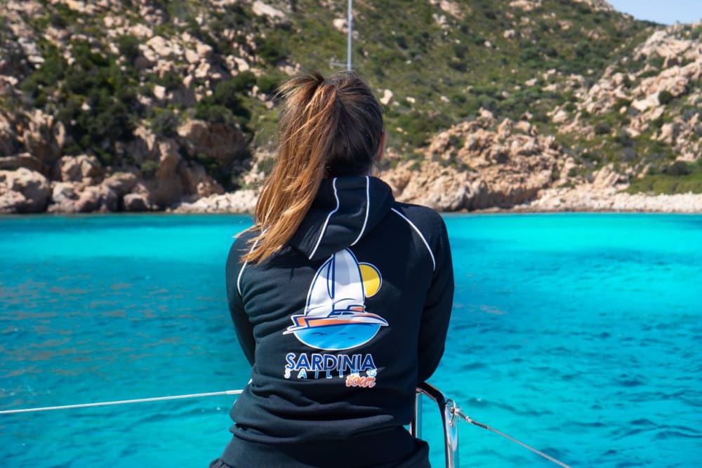 Full Day Catamaran from Cannigione: Nature, Sea and Wonder