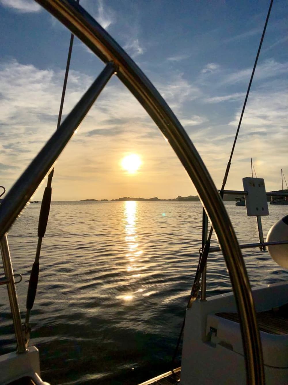 Sunset Cruise from Olbia: A magical sunset between the sea and islands facing the Maddalena and Caprera archipelagos.