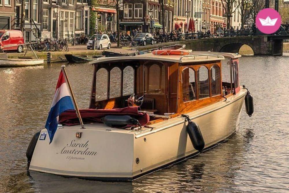 Paseo en barco privado de 2 horas por Ámsterdam: descubre la ciudad desde el agua