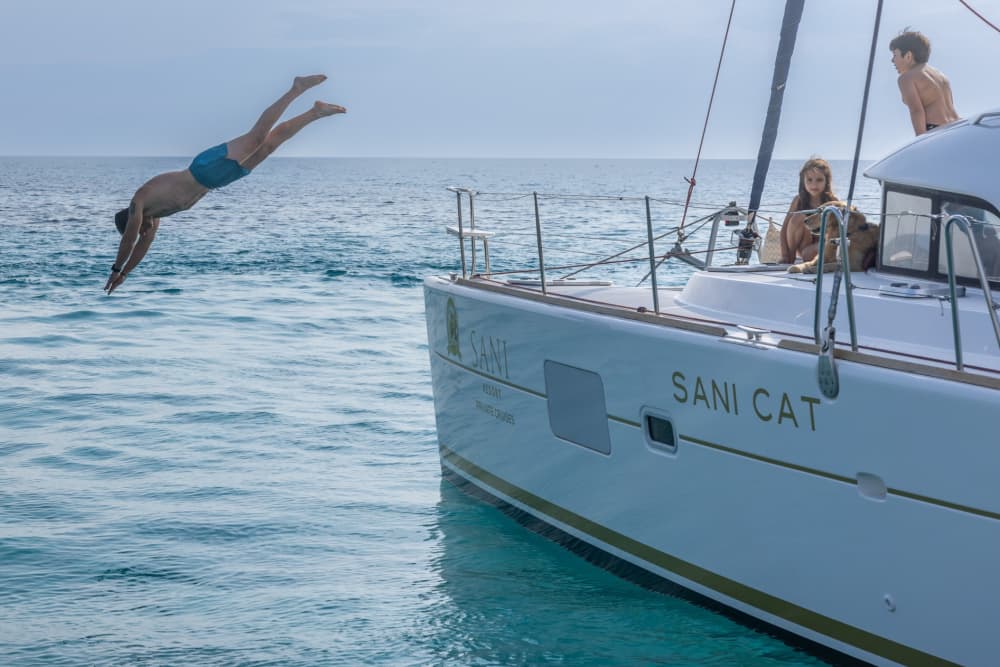 Spend a 8h sailing around Mallorca on a catamaran