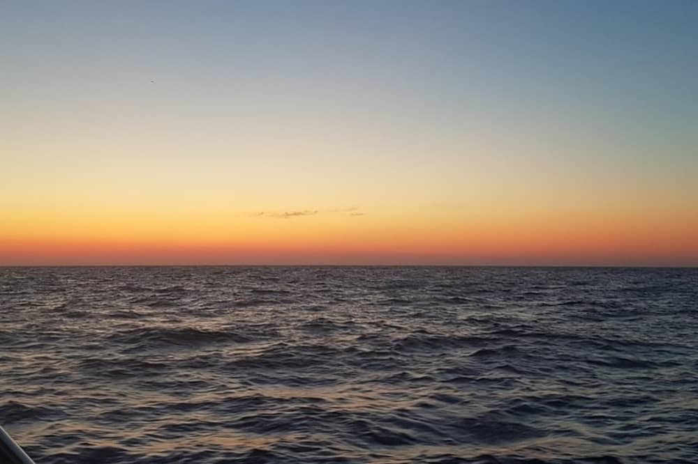 Sunset Dreams: una magica crociera serale all'isola di Dia