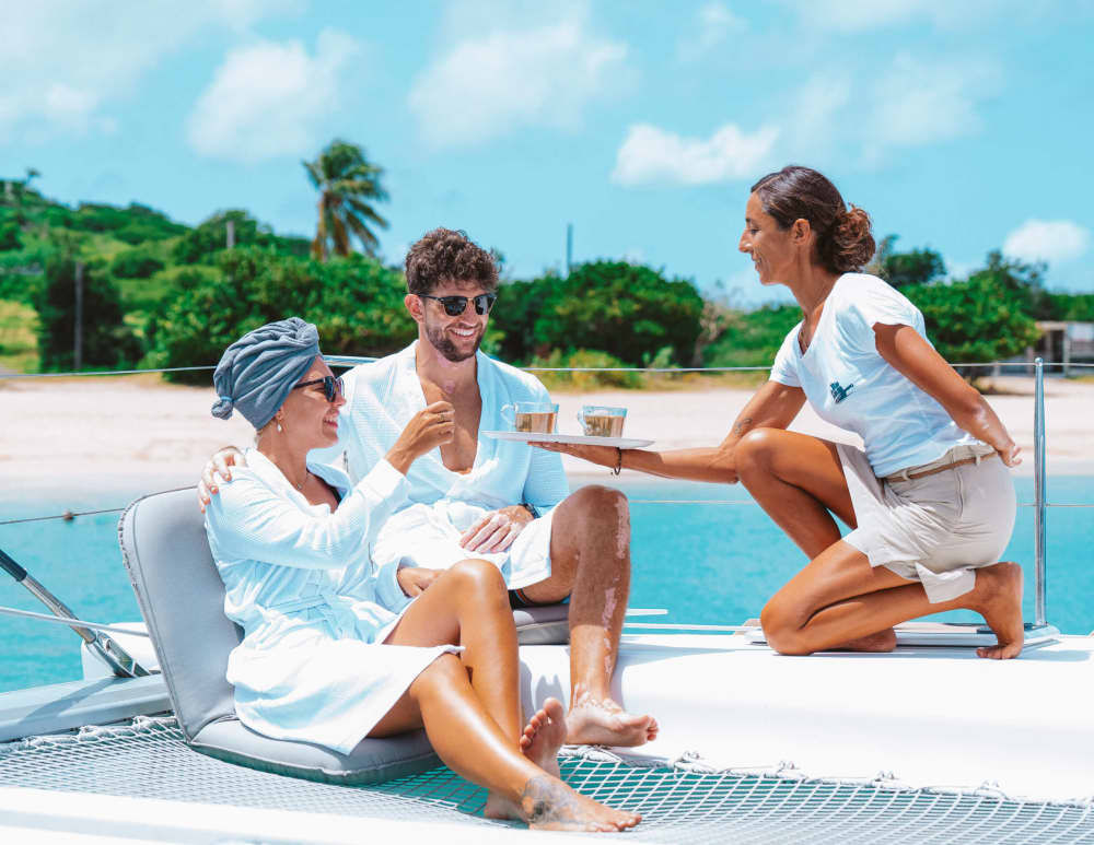 Spend a 9h sailing around Marigot on a sailboat