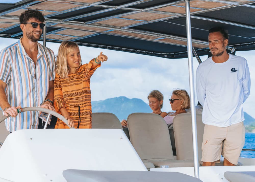 Spend a 9h sailing around Marigot on a sailboat