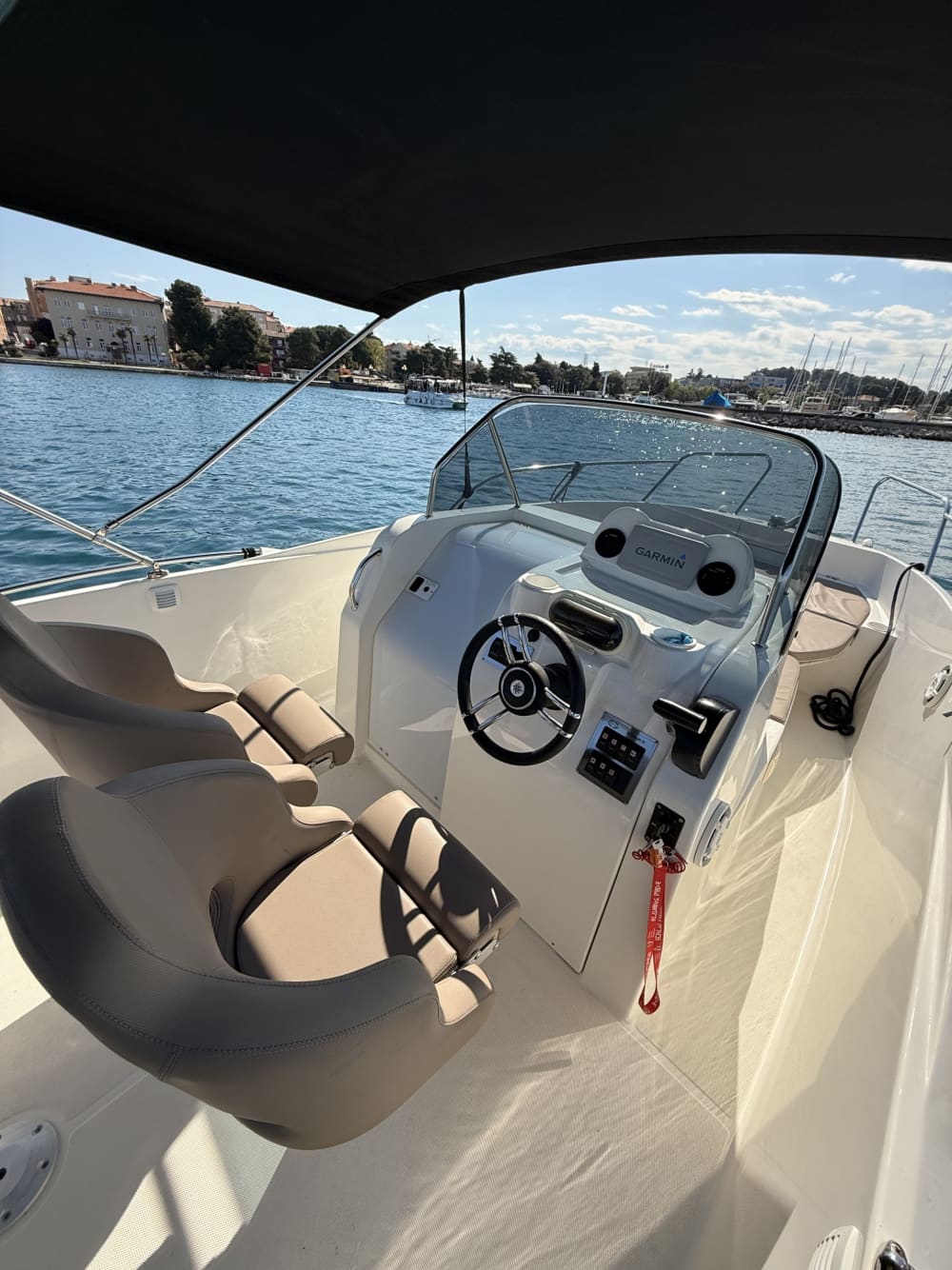 Discover Rovinj's shores: A complete day trip aboard a motorboat