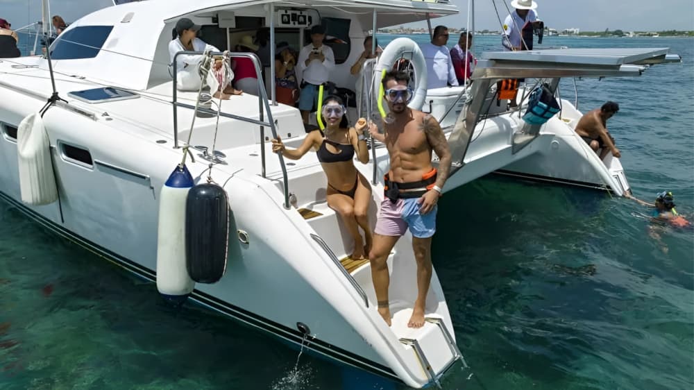 Sail, Snorkel, & Celebrate: Private Isla Mujeres Catamaran Adventure