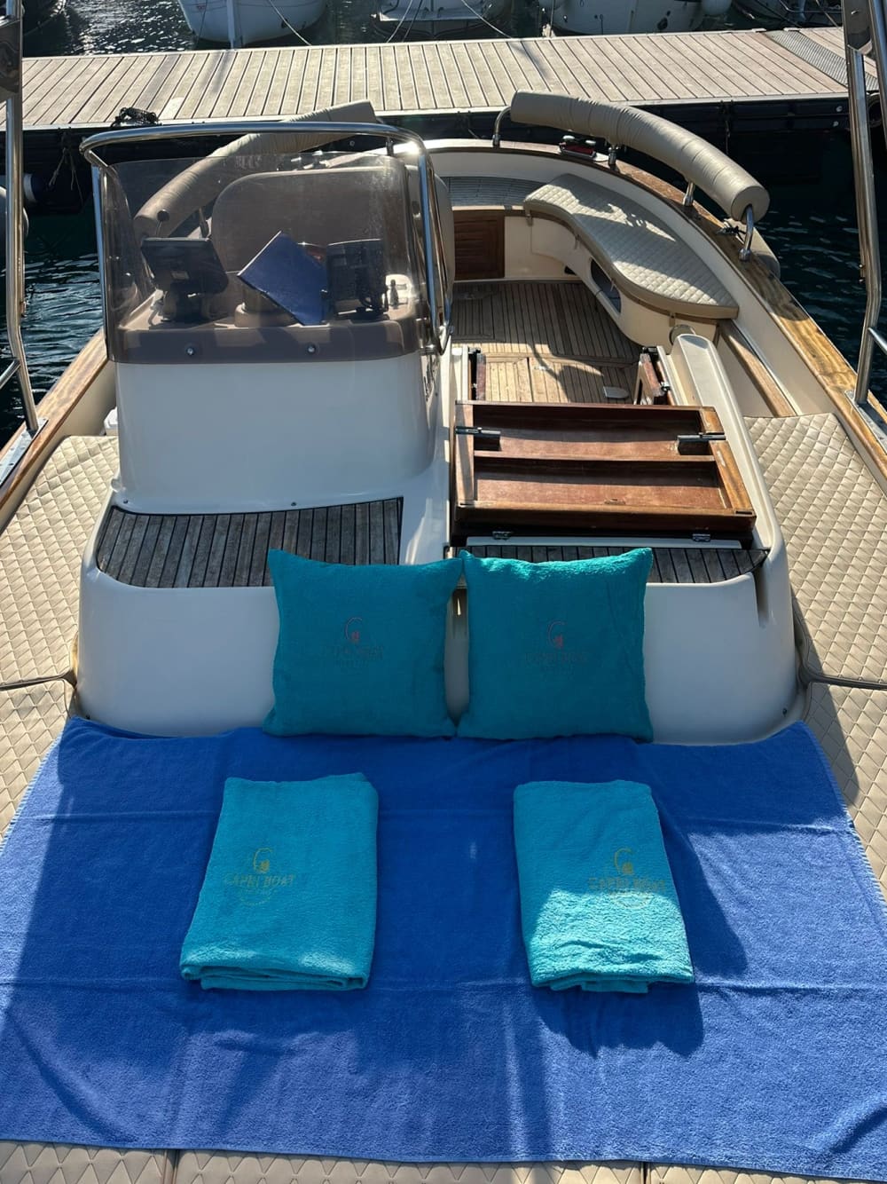Capri by boat – caves, Faraglioni rocks, and crystal-clear sea