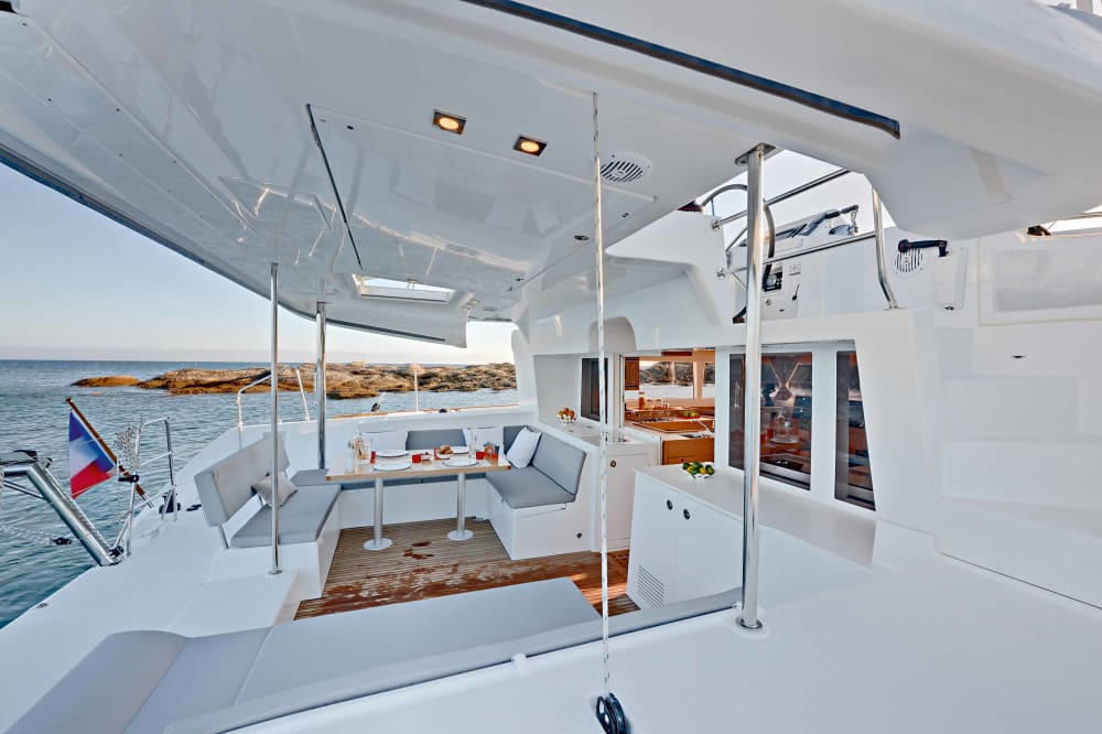 Exclusive sunset aboard a luxurious 14-meter catamaran in the heart of the Maddalena Archipelago with sunset over the Strait of Bonifacio