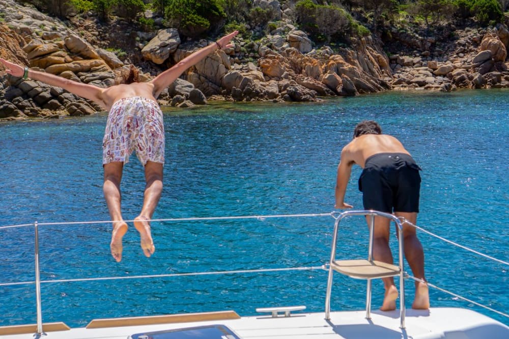 Day tour on a luxury 14-meter catamaran to the Maddalena Archipelago from Porto Rafael