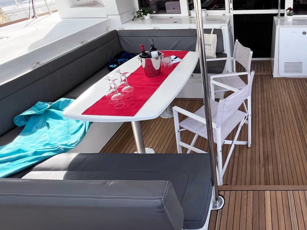Exclusive sunset aboard a luxurious 14-meter catamaran in the heart of the Maddalena Archipelago with sunset over the Strait of Bonifacio