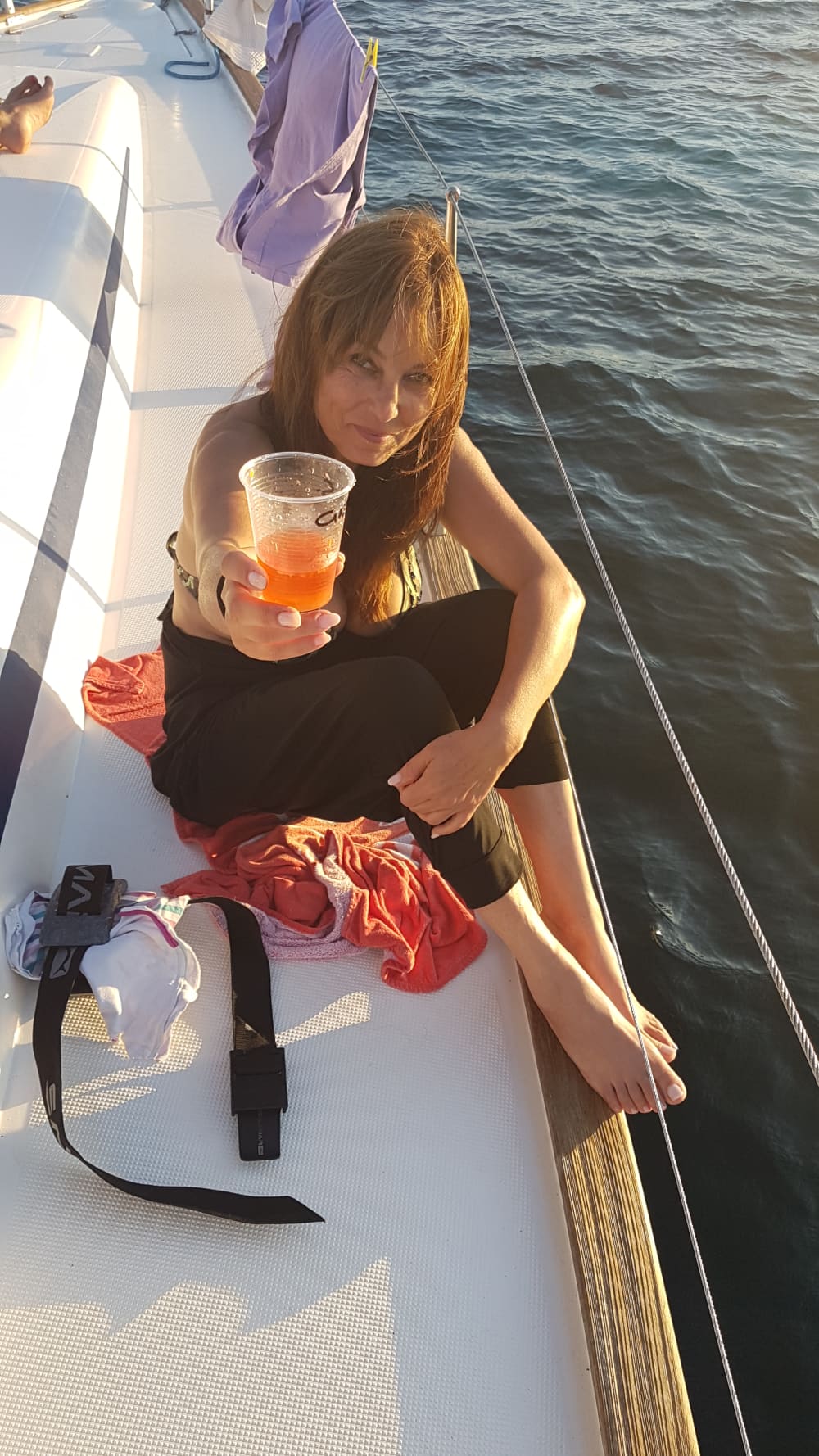 Exclusive sunset aboard a luxurious 14-meter catamaran in the heart of the Maddalena Archipelago with sunset over the Strait of Bonifacio