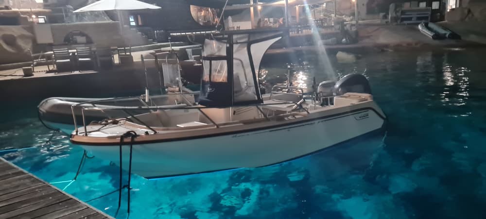 Exclusive sunset aboard a luxurious 14-meter catamaran in the heart of the Maddalena Archipelago with sunset over the Strait of Bonifacio