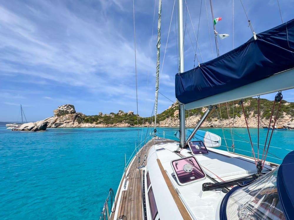 Tavolara and Molara in search of dolphins: a full-day adventure on a 15-meter sailing boat.