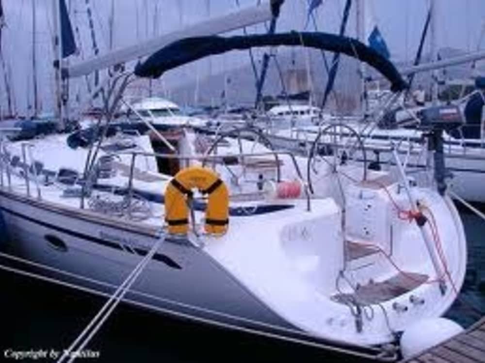 Cannigione Sunset Sail: Aperitif & Golden Views of the Maddalena Archipelago and Caprera
