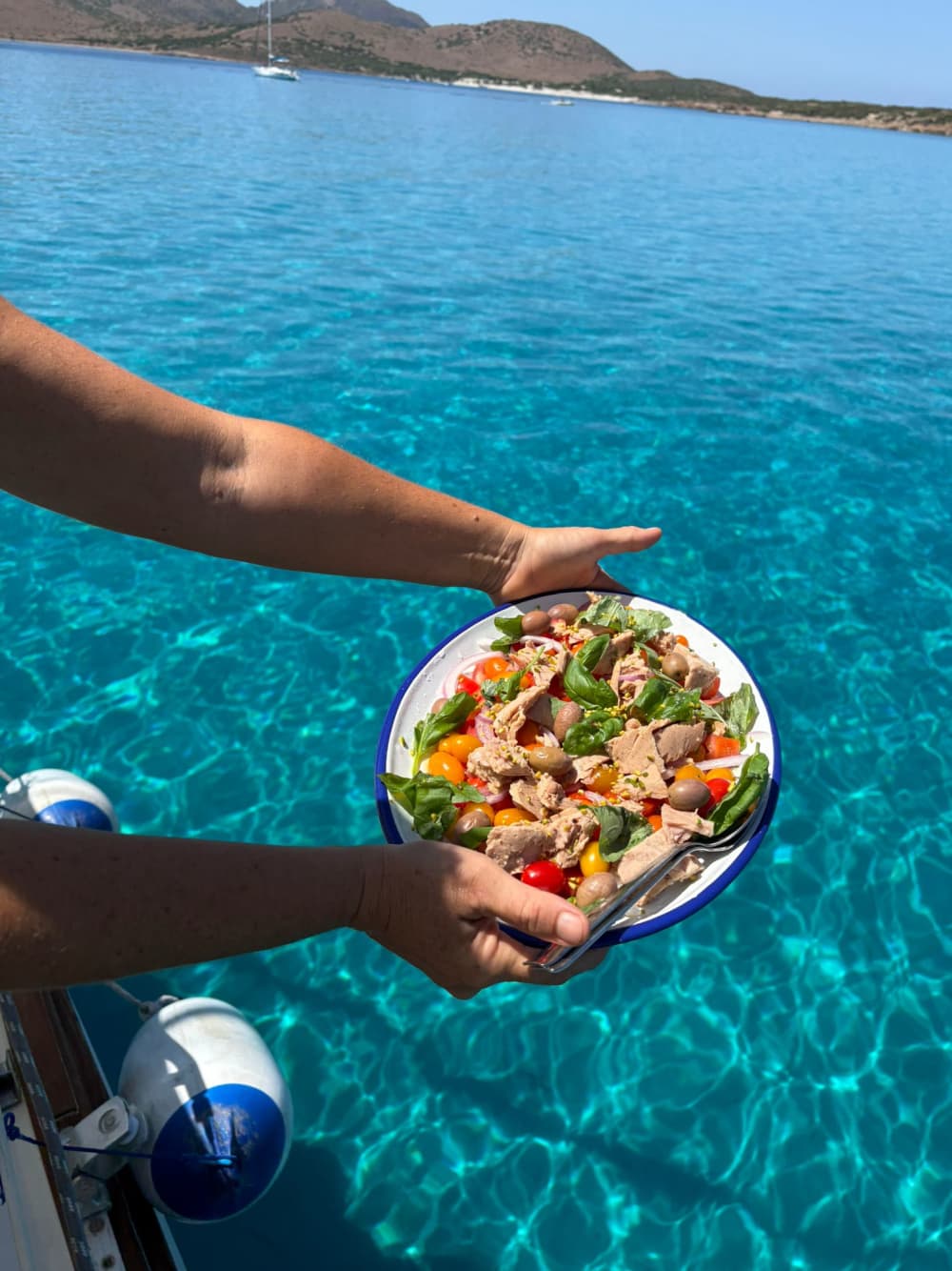 Full day among the blue waters of the Gulf of Teulada with an exclusive boat