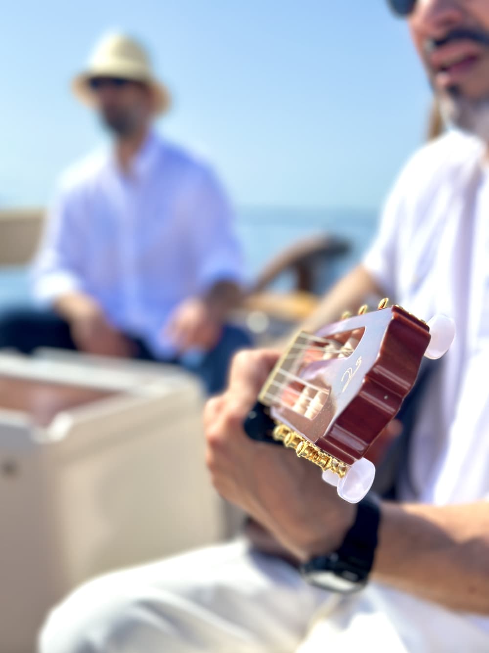 Sail with live Music accompanied by an acoustic guitar