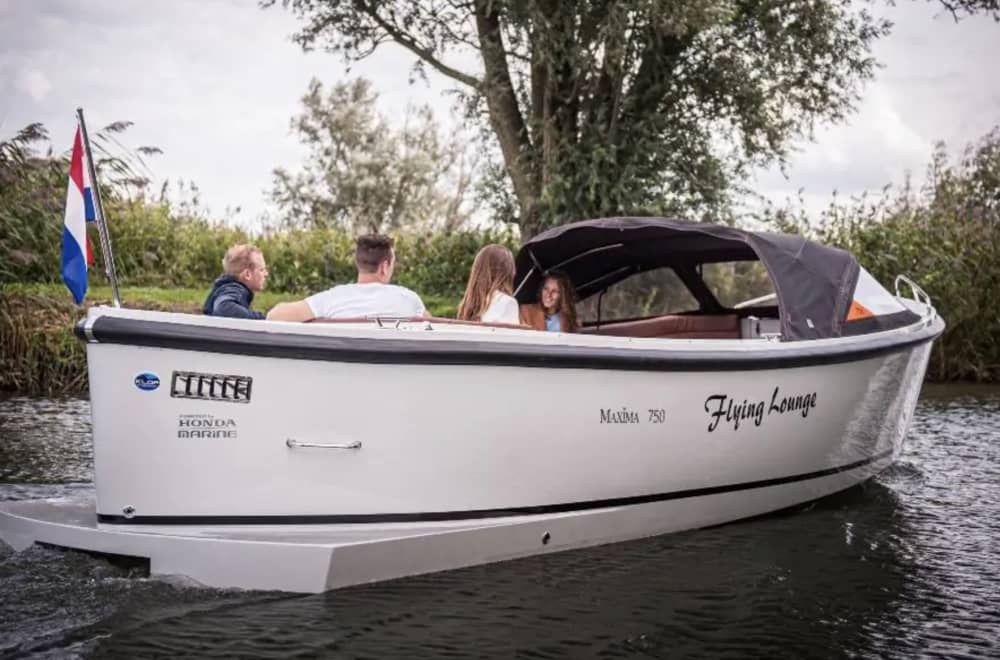 Ta en halvdag för att koppla av på en motorbåt i Amsterdams centrum