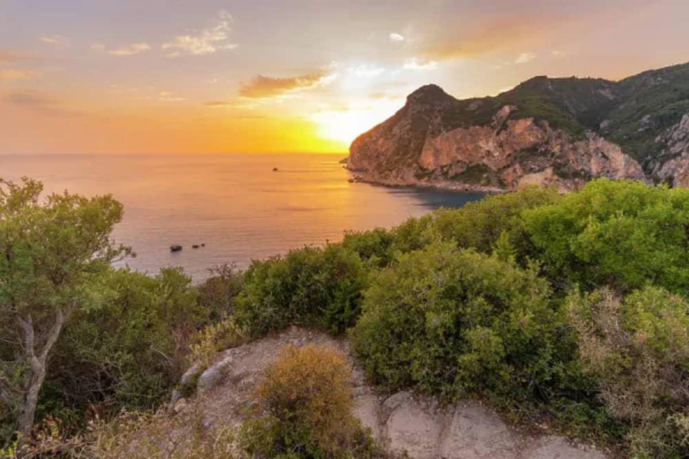 Sunset Journey Along Corfu’s Rugged Coastline