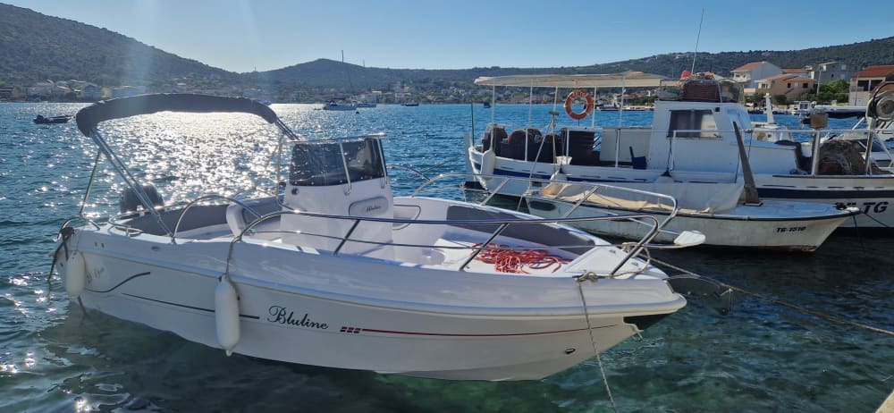 Explore the hidden bays of Vinišće on a motorboat