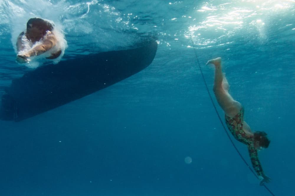 Esplora la costa nord o sud di Minorca su un llaut minorchino (8 ore)