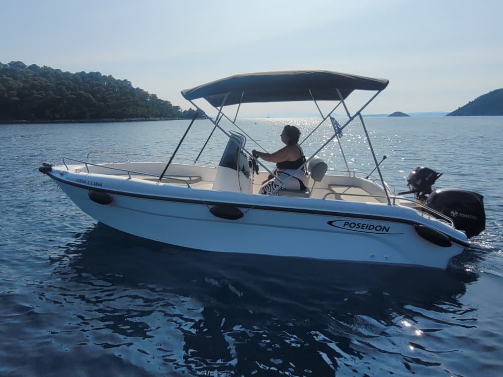 Enjoy a half-day Odyssey around Skopelos on a motorboat