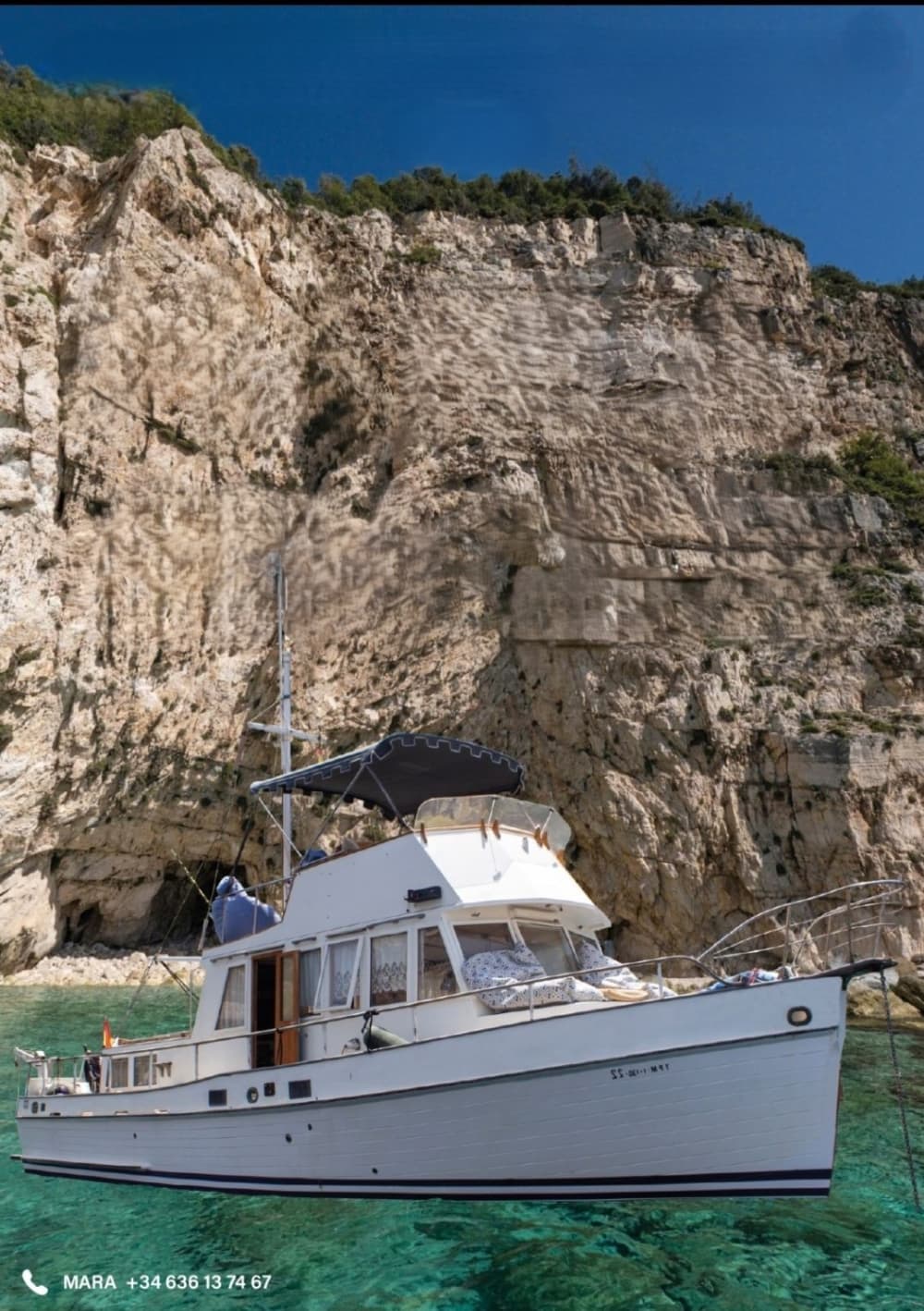 Passeio de 5 horas saindo de Santa Eulária, navegando pela costa até Tagomago