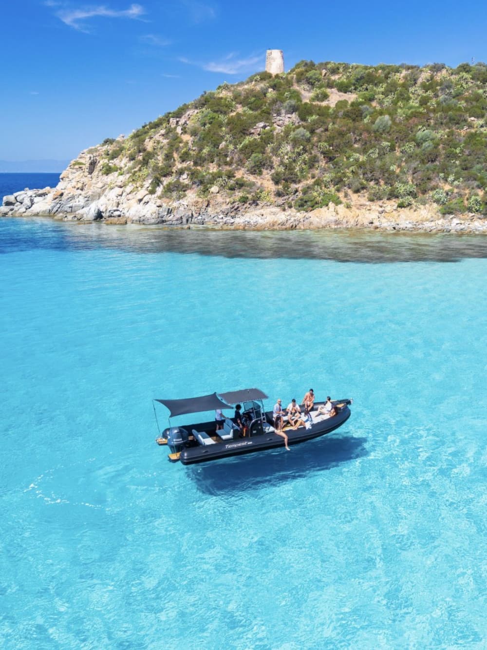 Cagliari Boat Tour with Sardinian Aperitif & Snorkeling in Crystal-Clear Waters