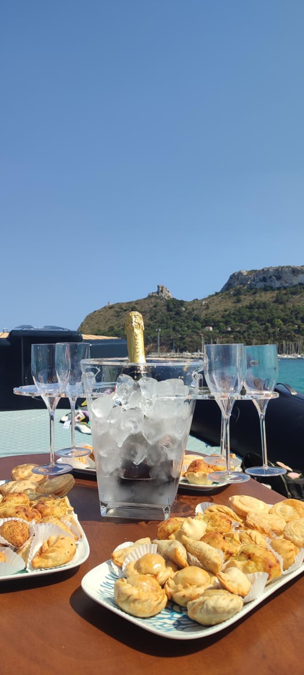 Cagliari Boat Tour with Sardinian Aperitif & Snorkeling in Crystal-Clear Waters