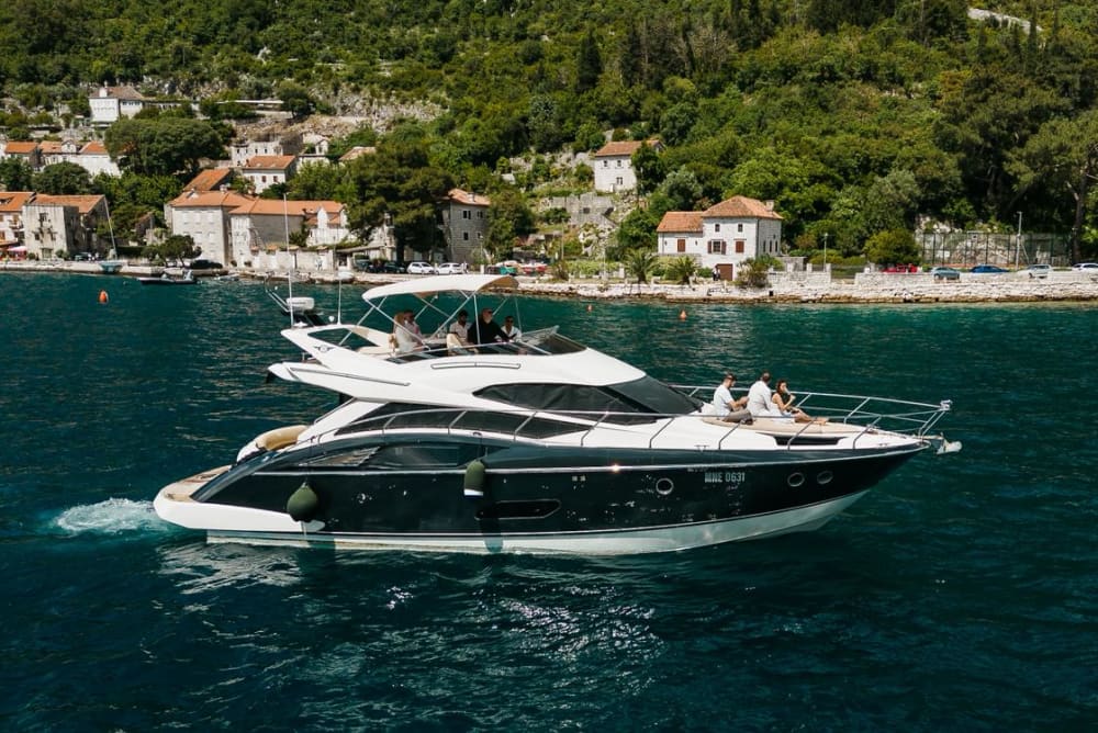 Full-Day Yacht Escape: History, Caves & Hidden Beaches from Boka Bay