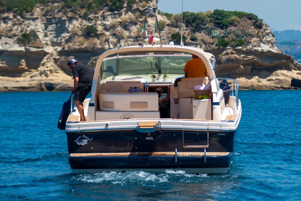 Half-day sporting experience from Bacoli: inshore fishing with professional equipment aboard a luxury yacht