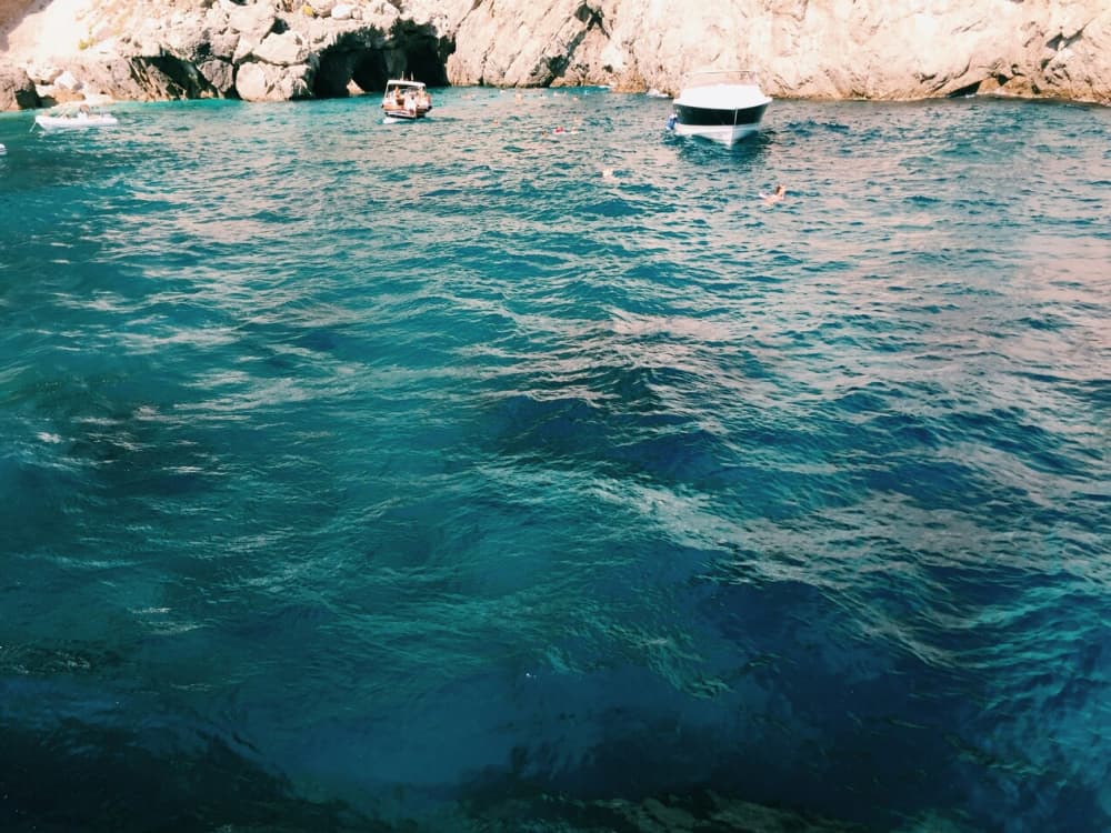 Capri Sunset: Elite Cruise to the Mythical Faraglioni