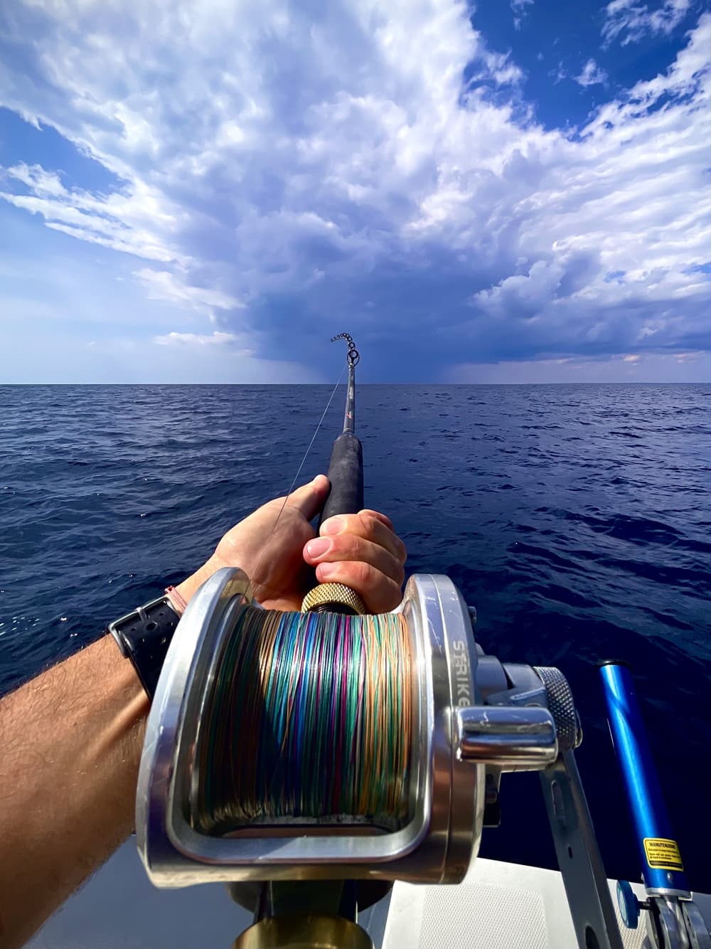 Fishing and swimming on a boat in Porto Cesareo - a private experience