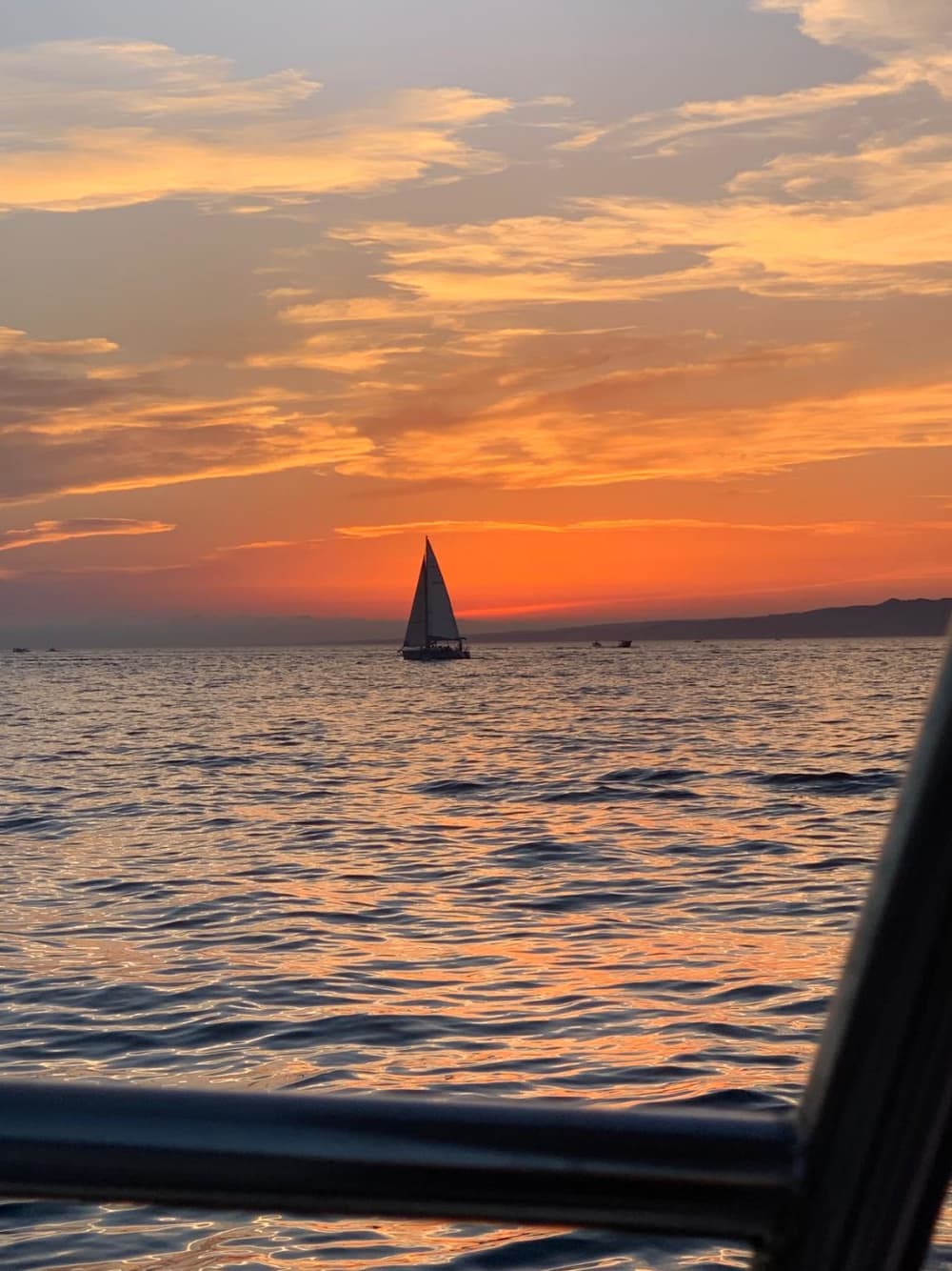 Zonsonderganguitje in een beschutte baai