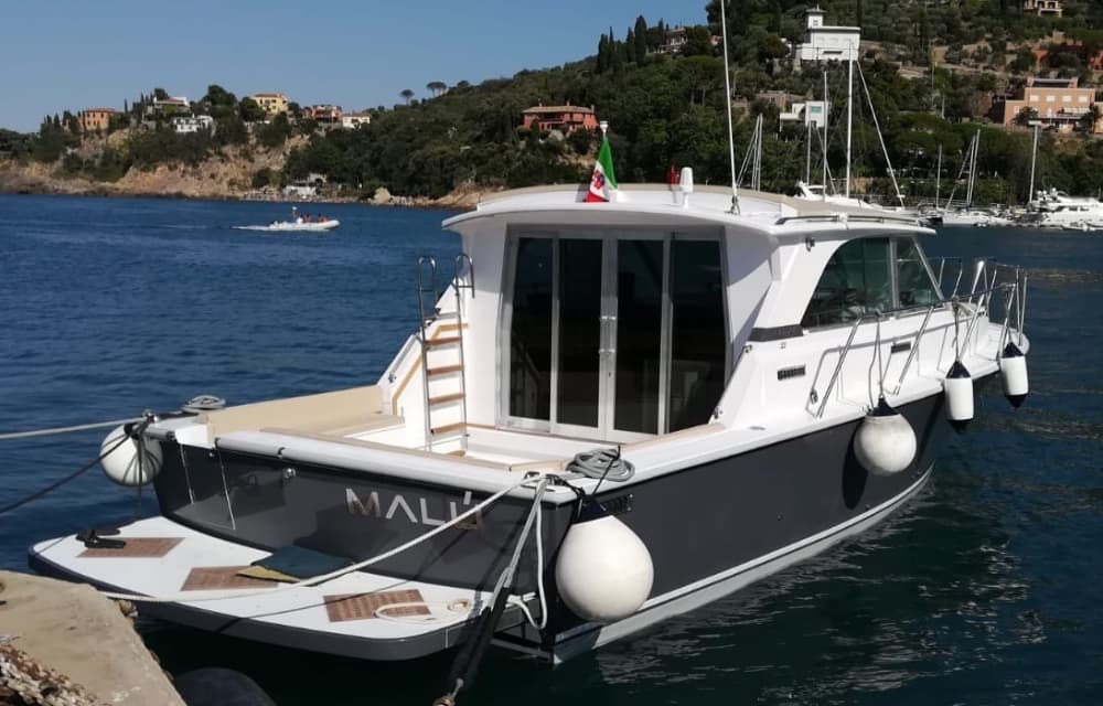 Discover Porto Santo Stefano: A full day of sun on a motorboat
