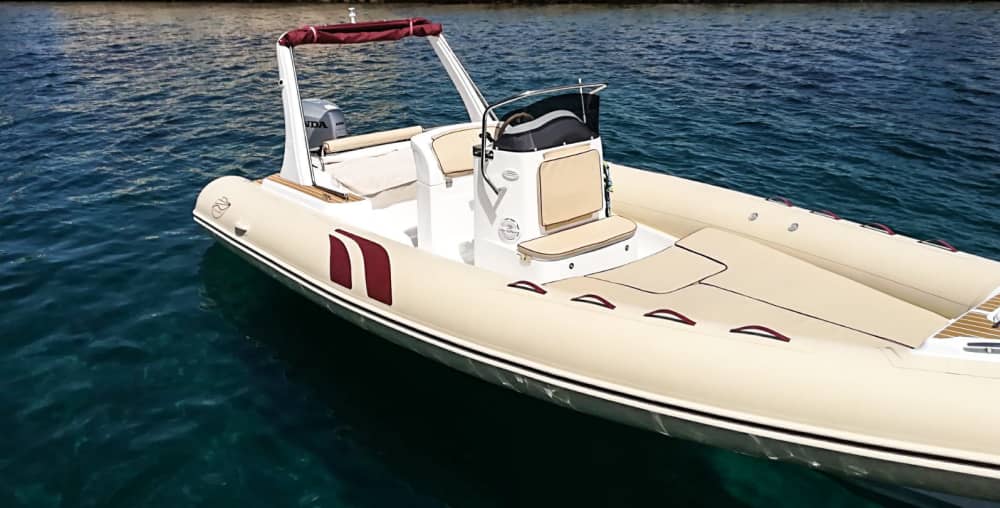 Discover Cannigione's shores: A complete day trip aboard a motorboat