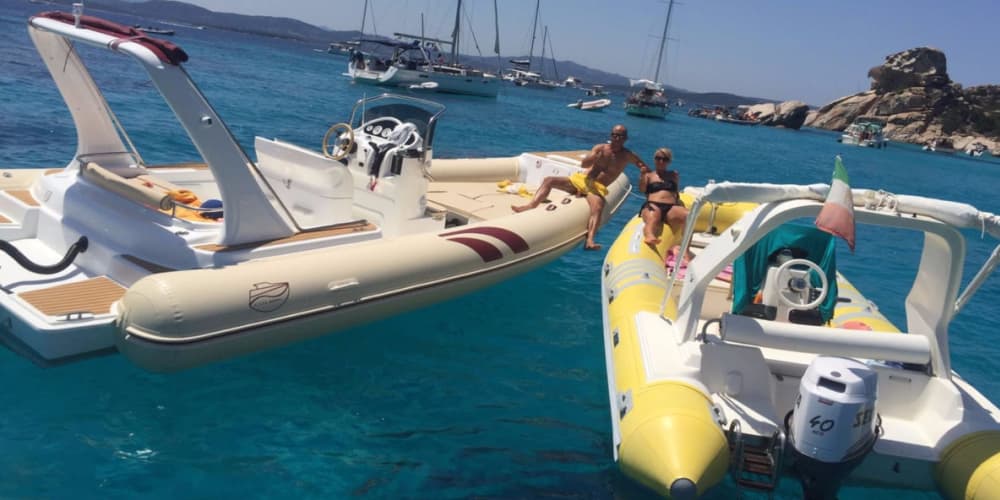 Discover Cannigione's shores: A complete day trip aboard a motorboat