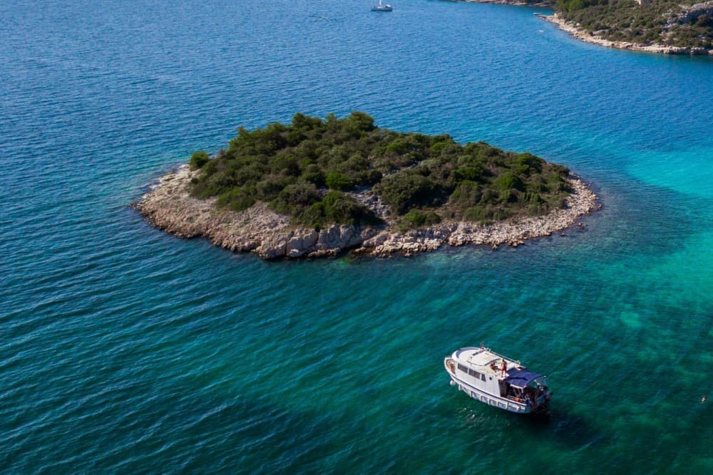 Discover Biograd na Moru's shores: A complete day trip aboard a motorboat