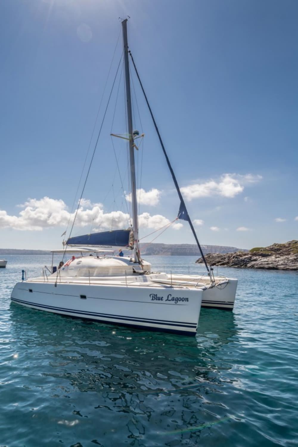 Set your course for joy: A full day of authentic sailing in Santorini on a catamaran