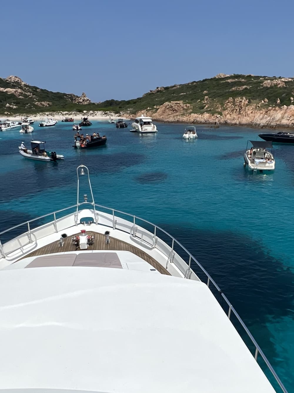 A day on the Costa Smeralda aboard a luxury yacht to discover the crystal-clear waters.