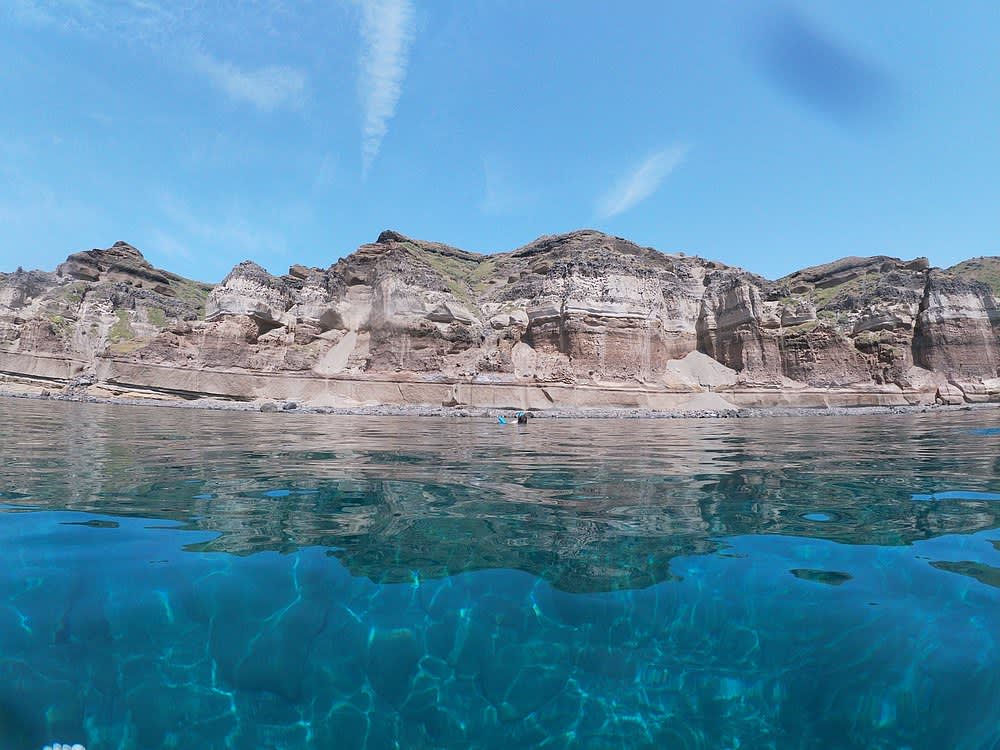 Semi-privé catamaran cruise bij zonsondergang met barbecue, drankjes en transfers.
