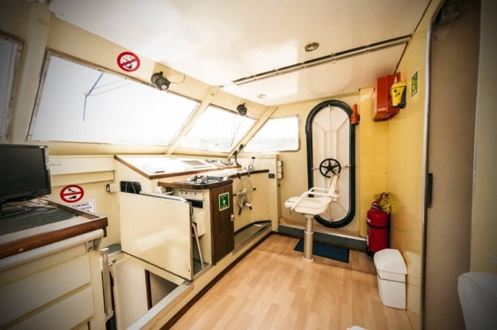 Explorez Marsaxlokk en une demi-journée : louez un bateau à moteur pour 4 h