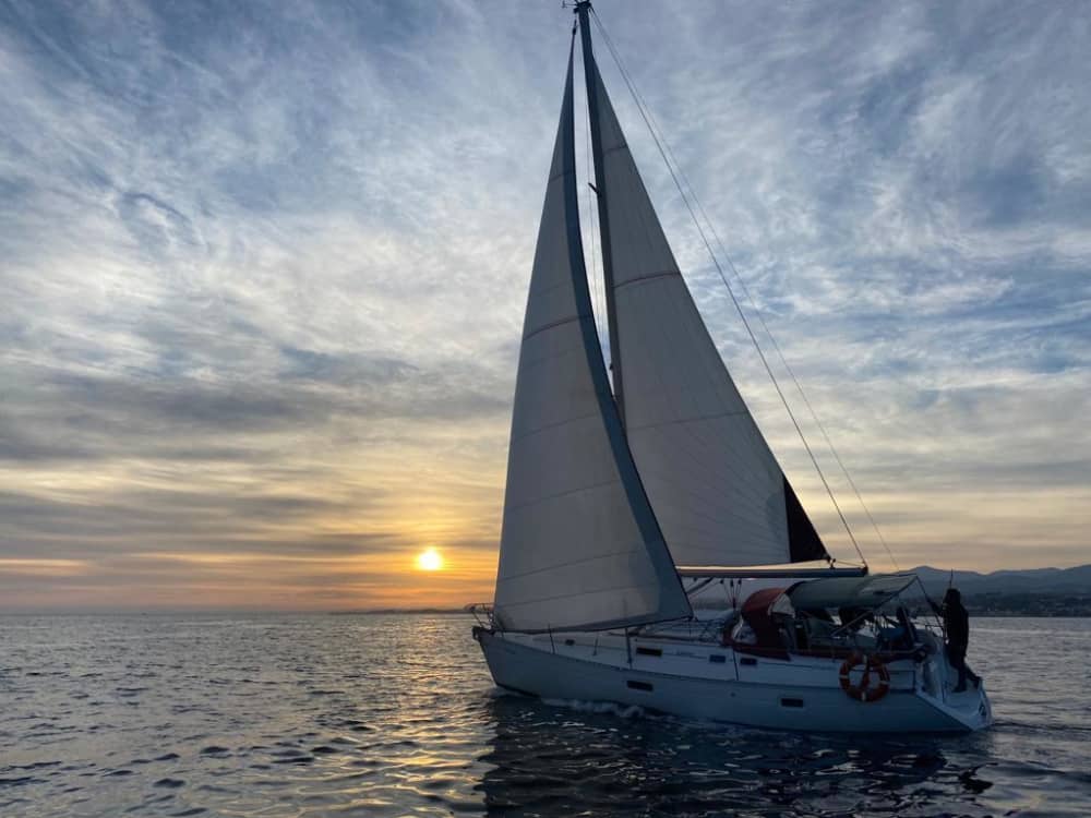 Explore Puerto Banús and enjoy a full day of sailing on a sailboat
