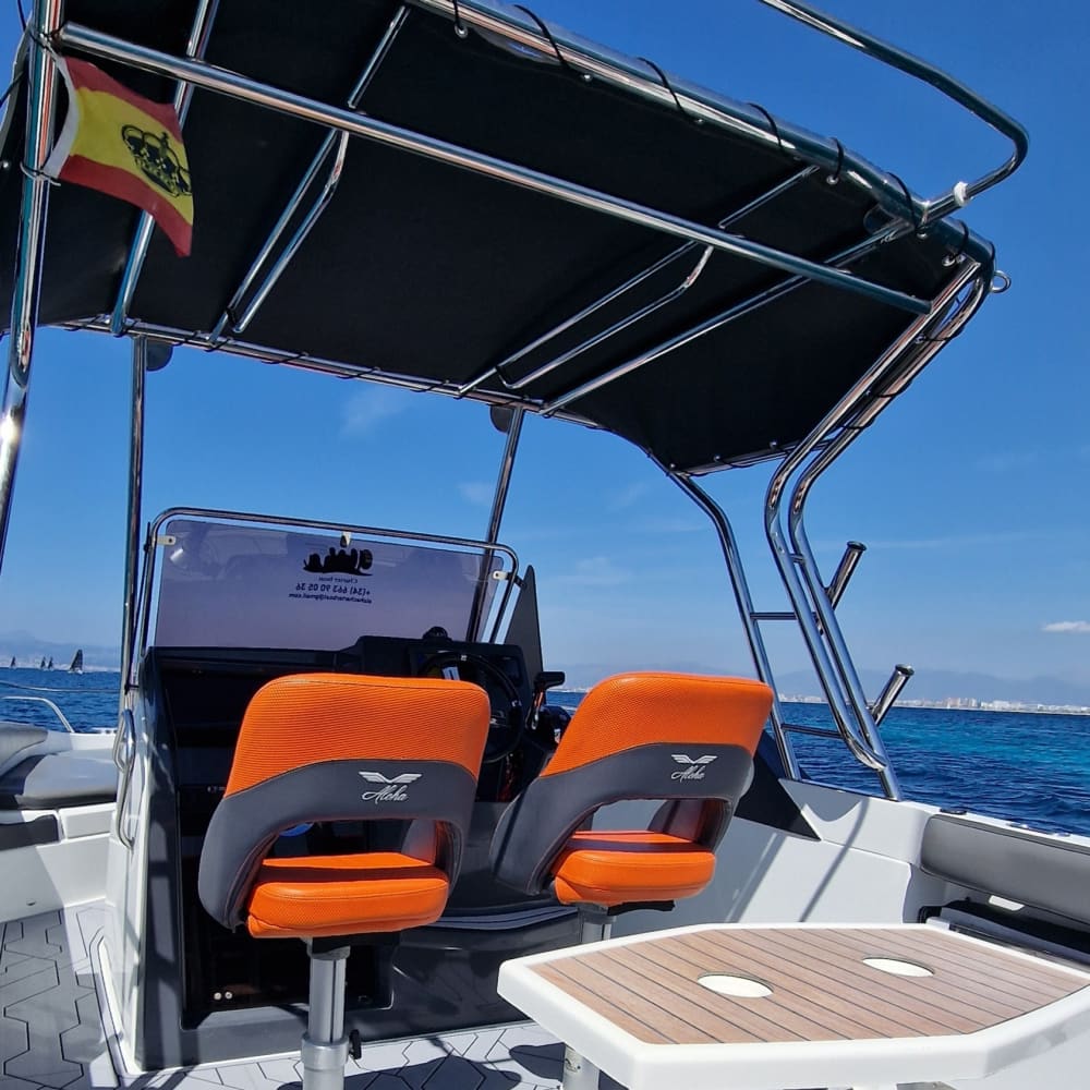 Discover Palma de Mallorca's shores: A complete day trip aboard a motorboat