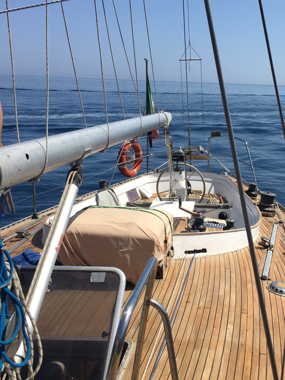 Enjoy a full day of sailing in Cannigione on a sailboat