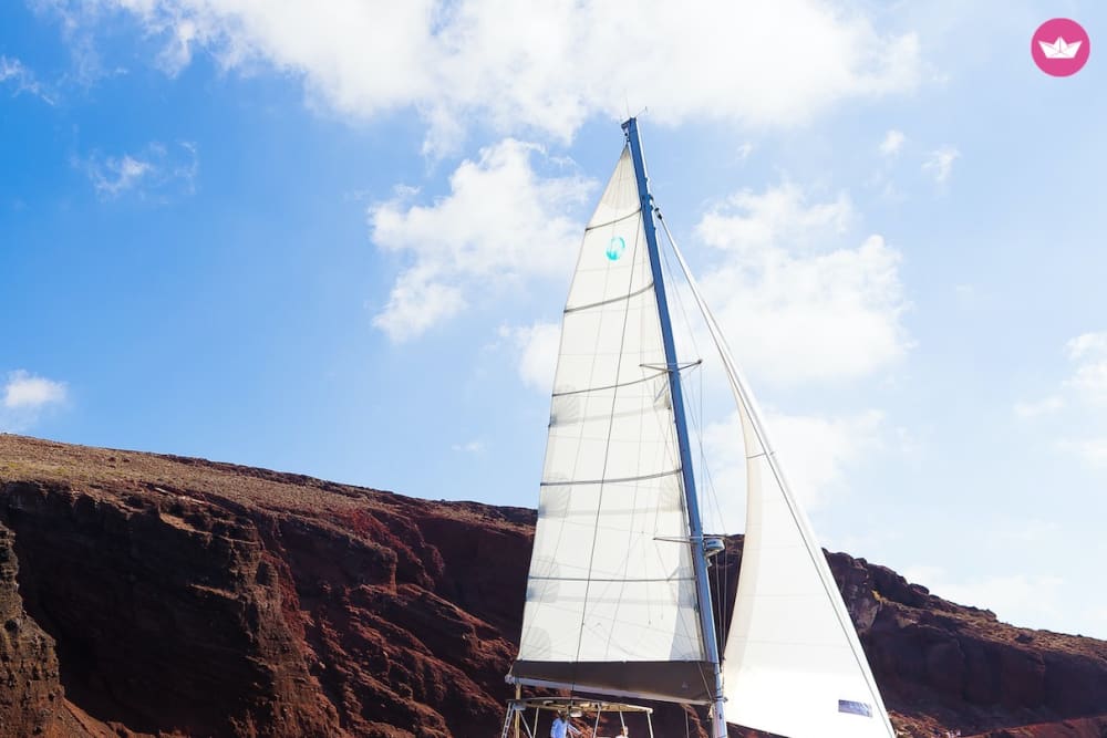 Privé catamarancruise overdag met barbecue, drankjes en vervoer