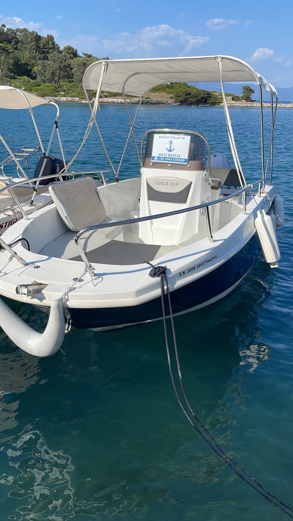 Discover Paxi's shores: A complete day trip aboard a motorboat