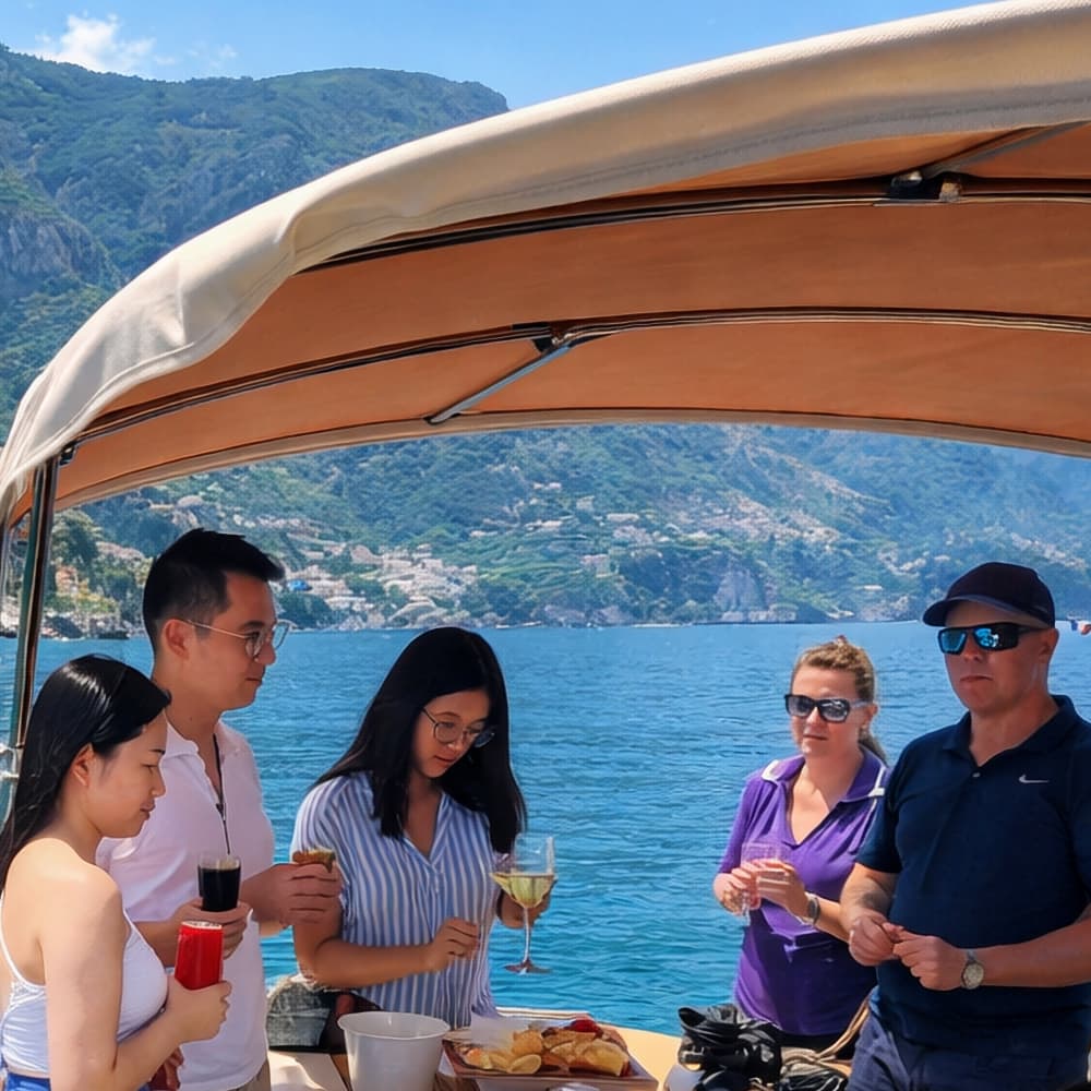 Capri Coast Adventure Cruise from Sorrento with Brunch & Free Bar