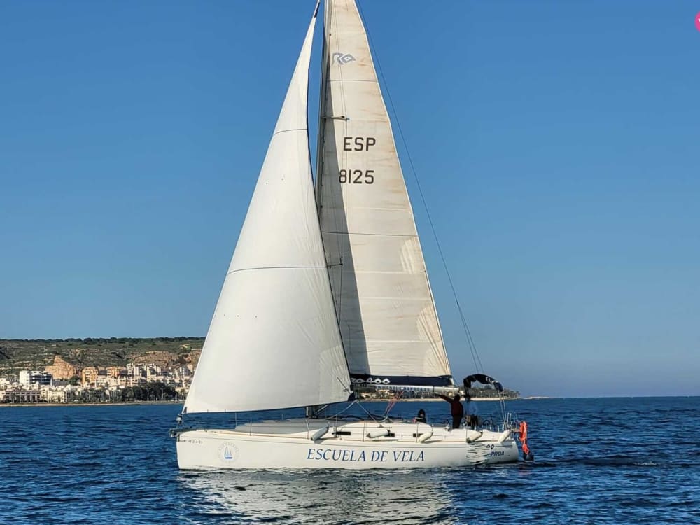 Enjoy a full day of sailing in Santa Pola on a sailboat