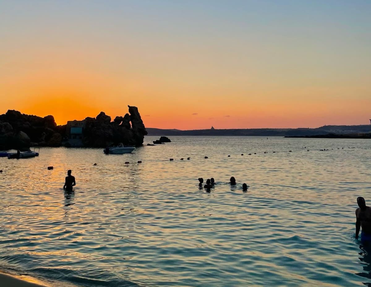 Tour privato in barca al tramonto