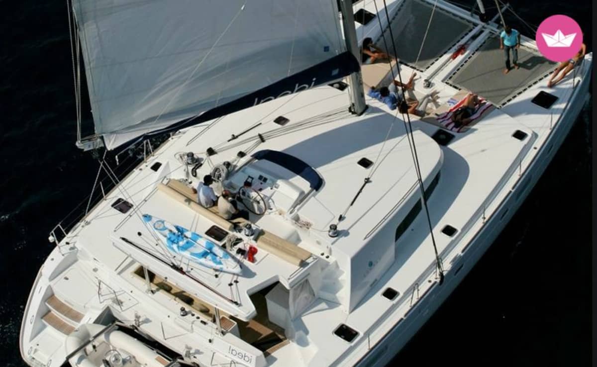 Excursion to Formentera or the southern beaches of Ibiza on a large catamaran.