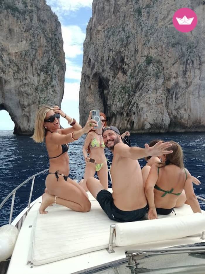 Capri between caves, Faraglioni rocks and turquoise waters